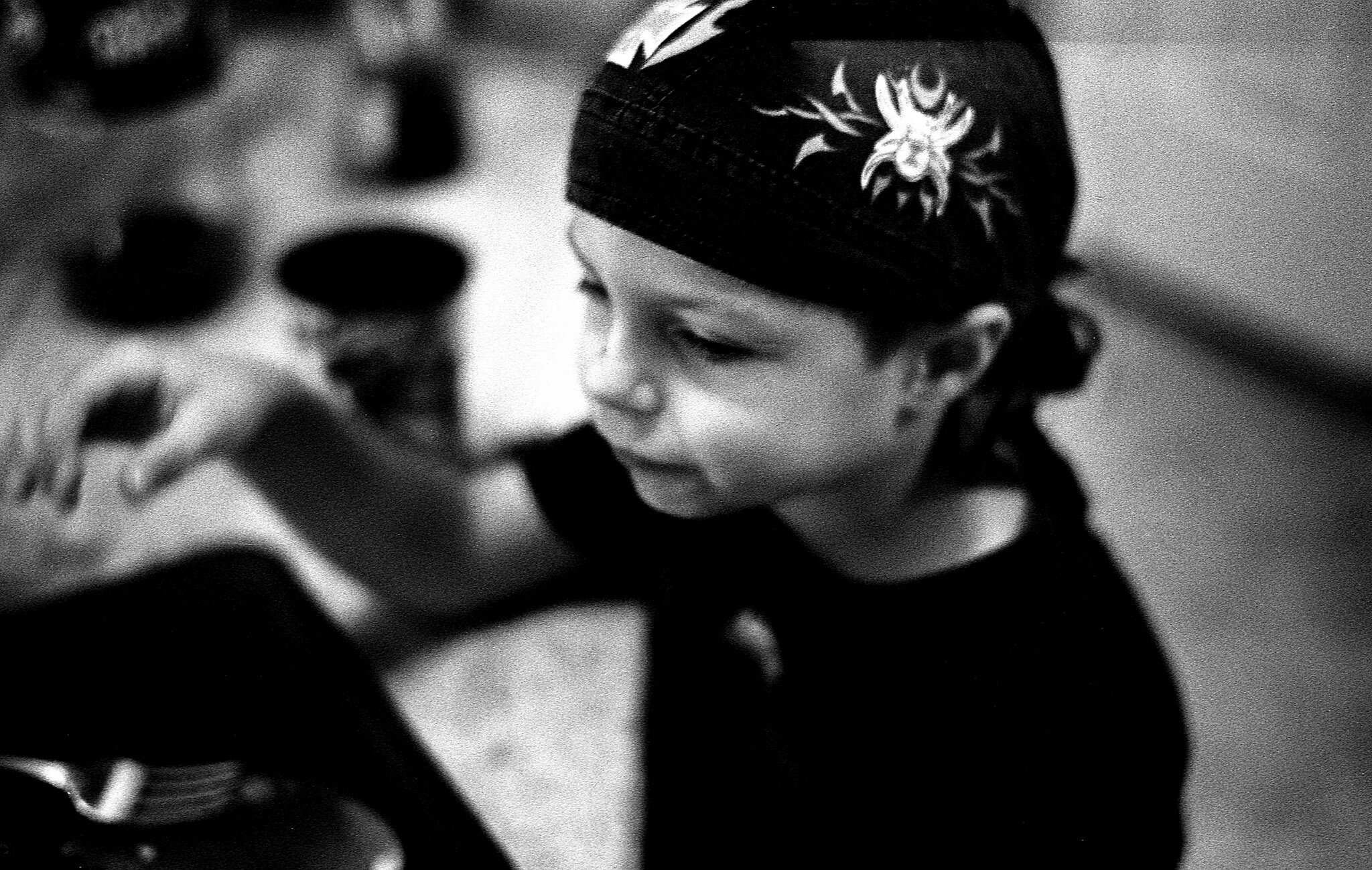 Pushing Film. In my kitchen, indoor light at night (ceiling fan), Kentmere 100 film, f/1.5 and 1/60sec.