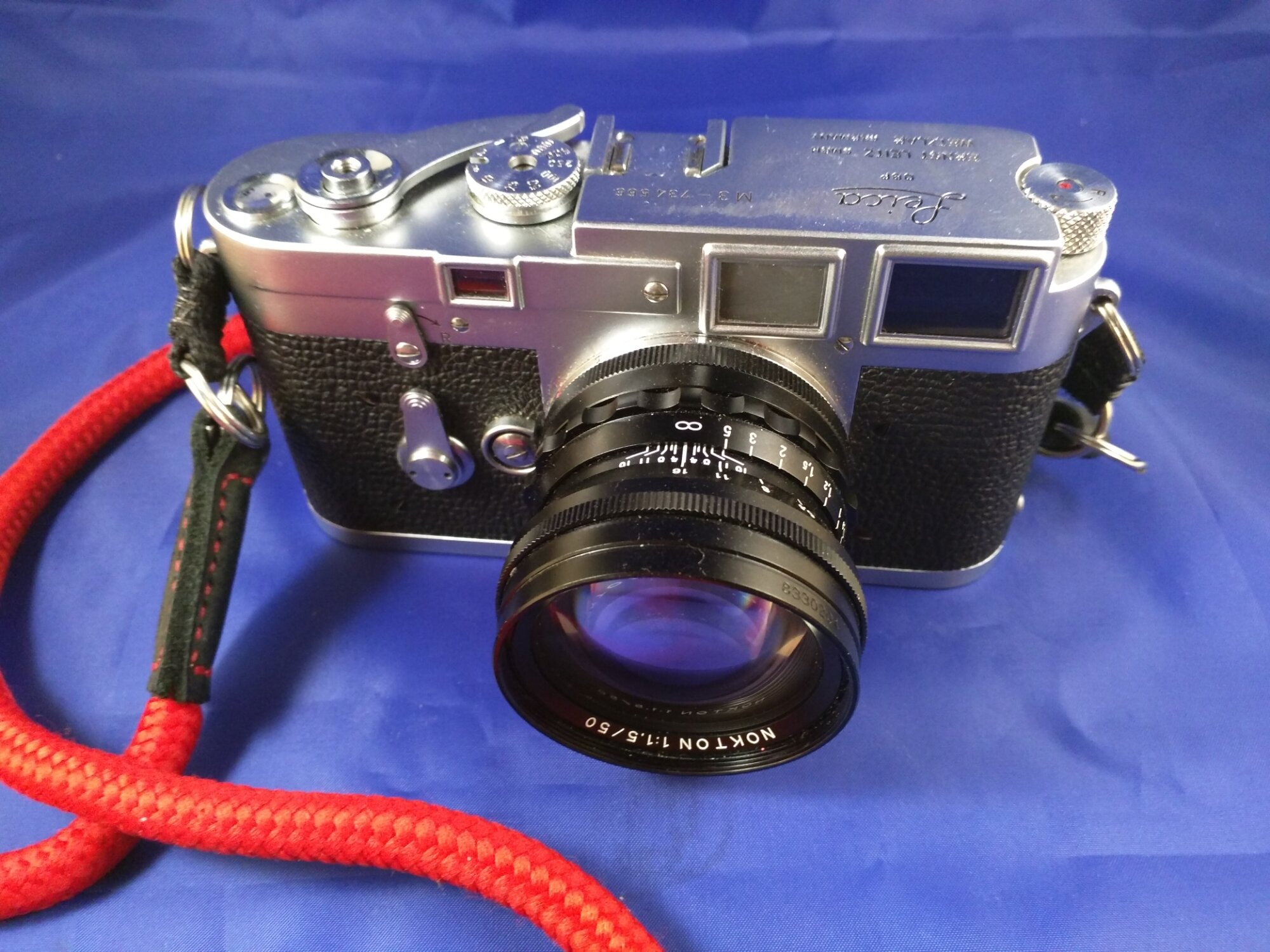 Leica M3, Voigtlander Nokton 50mm f/1.5 ... no, you can't get this camera for $50.